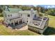 Aerial back view of home featuring multi-level decks, outdoor dining, and a pergola at 220 Epps Clark Rd, Siler City, NC 27344