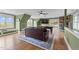 Inviting game room featuring a pool table, comfortable seating, and natural light from the windows at 220 Epps Clark Rd, Siler City, NC 27344