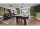 Spacious game room with a pool table, bar area, and plenty of room for entertaining guests and relaxing at 220 Epps Clark Rd, Siler City, NC 27344