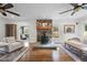 Inviting living room with hardwood floors and a stone fireplace at 220 Epps Clark Rd, Siler City, NC 27344