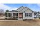 Charming single-Gathering home featuring a cozy front porch and welcoming curb appeal at 23 Sparkle Ln, Garner, NC 27529