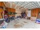 Spacious garage featuring ample storage space for tools and recreational equipment at 23 Sparkle Ln, Garner, NC 27529