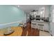 Eat-in kitchen with dining table and chairs adjacent to the well-equipped cooking area at 23 Sparkle Ln, Garner, NC 27529