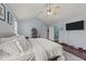 Bright main bedroom features vaulted ceiling, tv, and ensuite bathroom at 23 Sparkle Ln, Garner, NC 27529