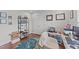 Functional home office with a desk, shelving, and natural light at 23 Sparkle Ln, Garner, NC 27529