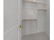Walk-in closet with built-in shelving and ample storage space, maximizing organization at 2623 Marchmont St, Raleigh, NC 27608
