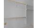 Bright closet features custom shelving, and wooden rods providing optimal storage space at 2623 Marchmont St, Raleigh, NC 27608