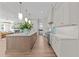 Spacious kitchen with large island, white cabinets, and pendant lighting at 2623 Marchmont St, Raleigh, NC 27608