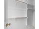 Bright closet with shelving and wooden rods, ideal for organized storage at 2623 Marchmont St, Raleigh, NC 27608