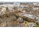 Aerial view of property, showcasing the building's surroundings and parking at 2821 Edridge Ct # 102, Raleigh, NC 27612