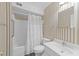 Neat bathroom featuring a bathtub, shower, and patterned wallpaper at 2821 Edridge Ct # 102, Raleigh, NC 27612