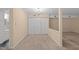 Bright dining room with closet space and modern chandelier lighting at 2821 Edridge Ct # 102, Raleigh, NC 27612