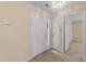 Inviting entryway featuring neutral paint, carpeted flooring, and closet at 2821 Edridge Ct # 102, Raleigh, NC 27612