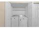 Convenient laundry room featuring a modern washer and dryer at 2821 Edridge Ct # 102, Raleigh, NC 27612