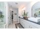 Bright bathroom features white cabinets, vessel sinks, and modern fixtures at 318 Highland Forest Dr, Fuquay Varina, NC 27526