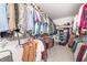 Walk-in closet with hanging racks and shelving provides ample storage space at 318 Highland Forest Dr, Fuquay Varina, NC 27526