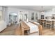 Open-concept dining area features a table and chairs, with access to both the kitchen and living room at 318 Highland Forest Dr, Fuquay Varina, NC 27526