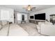Spacious living room with sectional couch, media center, and neutral decor at 318 Highland Forest Dr, Fuquay Varina, NC 27526
