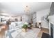 Spacious open-concept living room with comfortable seating and plenty of natural light at 318 Highland Forest Dr, Fuquay Varina, NC 27526