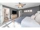 Comfortable main bedroom features neutral tones and a ceiling fan at 318 Highland Forest Dr, Fuquay Varina, NC 27526
