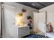 Nicely decorated room with space-themed decorations and a charming dresser at 3212 Oxford Dr, Durham, NC 27707