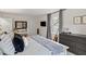 Bedroom featuring a comfortable bed, dresser, and a window for natural light at 3212 Oxford Dr, Durham, NC 27707