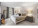Bedroom with a comfortable bed, soft carpet, and calming decor at 3212 Oxford Dr, Durham, NC 27707