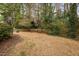 The spacious backyard features a traditional fence and space for outdoor activities at 3304 Glen Currin Dr, Raleigh, NC 27612