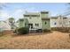 The home's backyard with a deck area at 3304 Glen Currin Dr, Raleigh, NC 27612