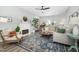 Comfortable living room featuring a fireplace, neutral-toned furniture, and stylish decor at 3304 Glen Currin Dr, Raleigh, NC 27612