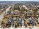 Aerial view of a suburban neighborhood featuring neatly landscaped homes with mature trees at 3732 Coach Lantern Ave, Wake Forest, NC 27587