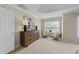 Bedroom featuring a window view, decor, and sitting area at 3732 Coach Lantern Ave, Wake Forest, NC 27587