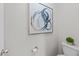Powder room featuring modern art and contemporary fixtures at 3732 Coach Lantern Ave, Wake Forest, NC 27587