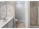 The bathroom features a single sink vanity, a shower and tile flooring at 4050 Brooksdale Dr, Franklinton, NC 27525