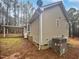 Exterior of house with siding and a covered parking area and patio at 4050 Brooksdale Dr, Franklinton, NC 27525