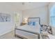 Charming bedroom with a view to the en-suite bathroom, creating a serene and private retreat at 410 Bent Tree Ln, Cary, NC 27519