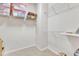 Spacious walk-in closet with multiple shelves for optimal storage and organization at 410 Bent Tree Ln, Cary, NC 27519