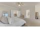 View of a large main bedroom with an ensuite bathroom and a walk-in closet at 410 Bent Tree Ln, Cary, NC 27519