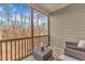 Screened porch offering lovely views of the natural landscape at 410 Bent Tree Ln, Cary, NC 27519