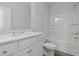 Bathroom featuring modern vanity, stylish fixtures, and shower over tub at 44 Fairwinds Drive Dr, Lillington, NC 27546