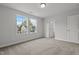 This bedroom has neutral walls, carpet, two windows, and closet at 44 Fairwinds Drive Dr, Lillington, NC 27546