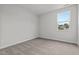 Bedroom featuring large window and carpeted floor at 44 Fairwinds Drive Dr, Lillington, NC 27546