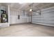 Unfinished garage space with an unfinished ceiling and concrete floor at 44 Fairwinds Drive Dr, Lillington, NC 27546