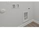Functional laundry room with essential hookups and clean, simple design at 44 Fairwinds Drive Dr, Lillington, NC 27546