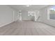 Spacious carpeted room with ample natural light, ideal for a living space at 44 Fairwinds Drive Dr, Lillington, NC 27546