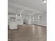 Open-concept living space with white cabinets and plenty of natural light at 44 Fairwinds Drive Dr, Lillington, NC 27546