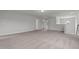 Spacious carpeted living room with overhead lighting and neutral colors at 44 Fairwinds Drive Dr, Lillington, NC 27546