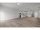 Open-concept living space with white cabinets and plenty of natural light at 44 Fairwinds Drive Dr, Lillington, NC 27546