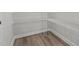 A walk-in pantry with ample shelving for optimal organization and storage at 44 Fairwinds Drive Dr, Lillington, NC 27546