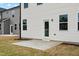 A concrete patio extends from the back door of this home at 44 Fairwinds Drive Dr, Lillington, NC 27546